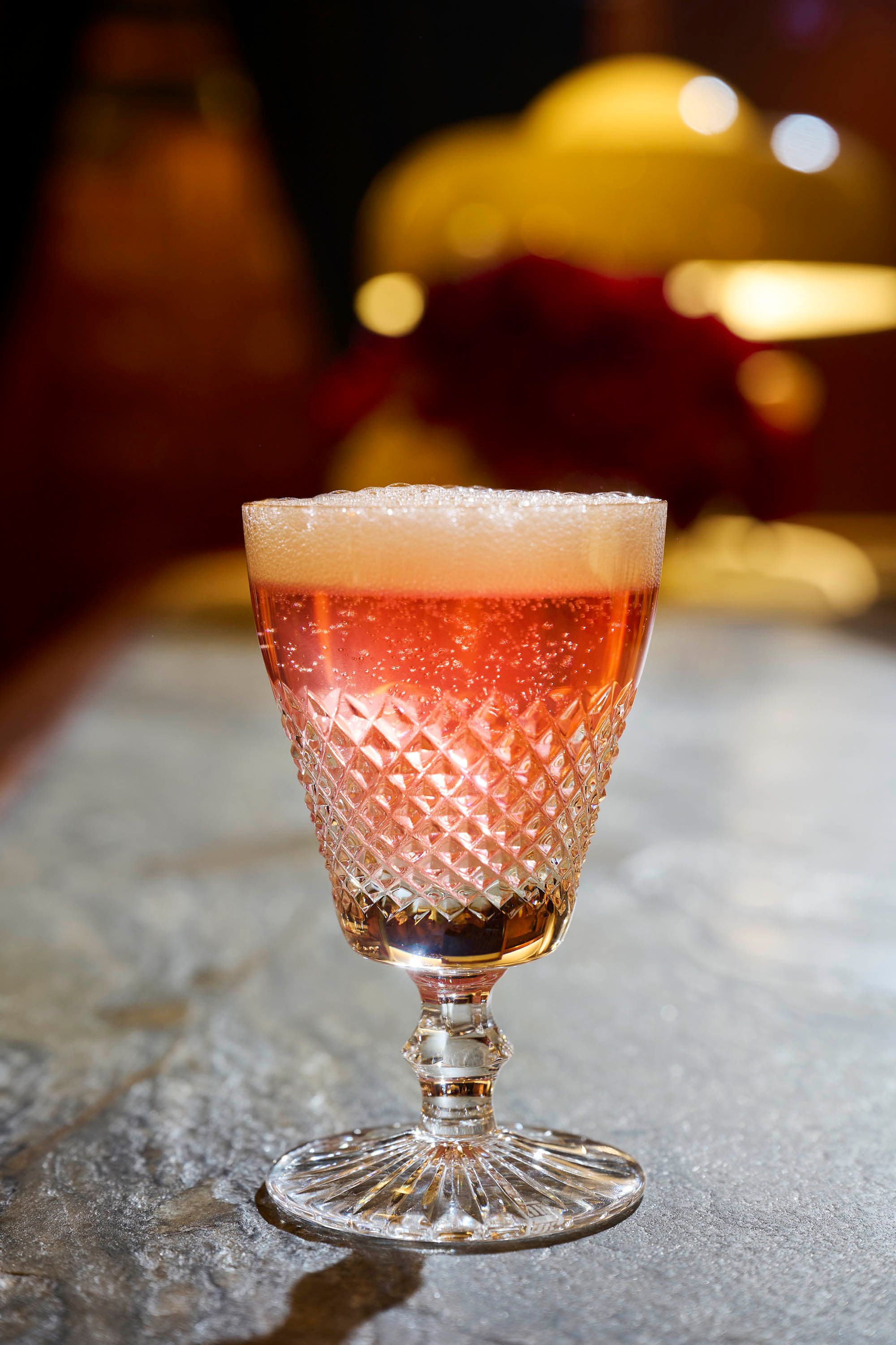The Champagne Royale — champagne, redcurrant, house liqueur de Chambord. Photo: Earl Carter/Supplied