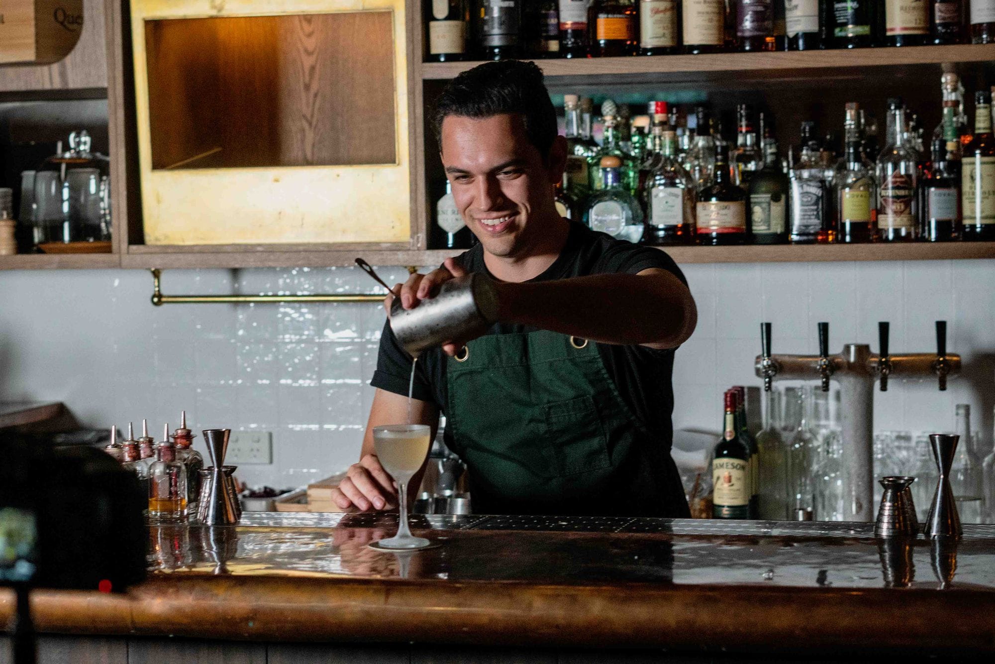 Alex behind the bar at The Rover in Surry Hills. Photo: Boothby