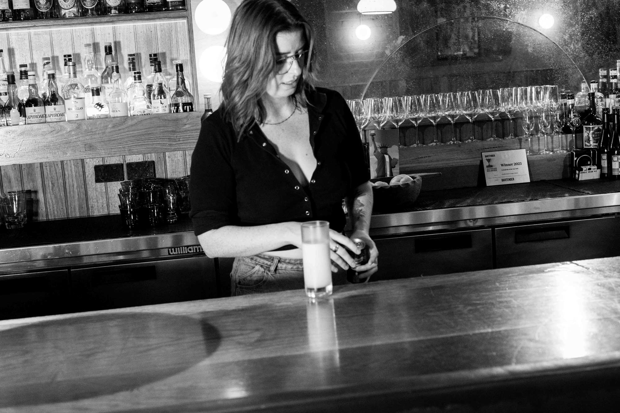 At Double Deuce Lounge, the general manager works in service. Photo: Boothby