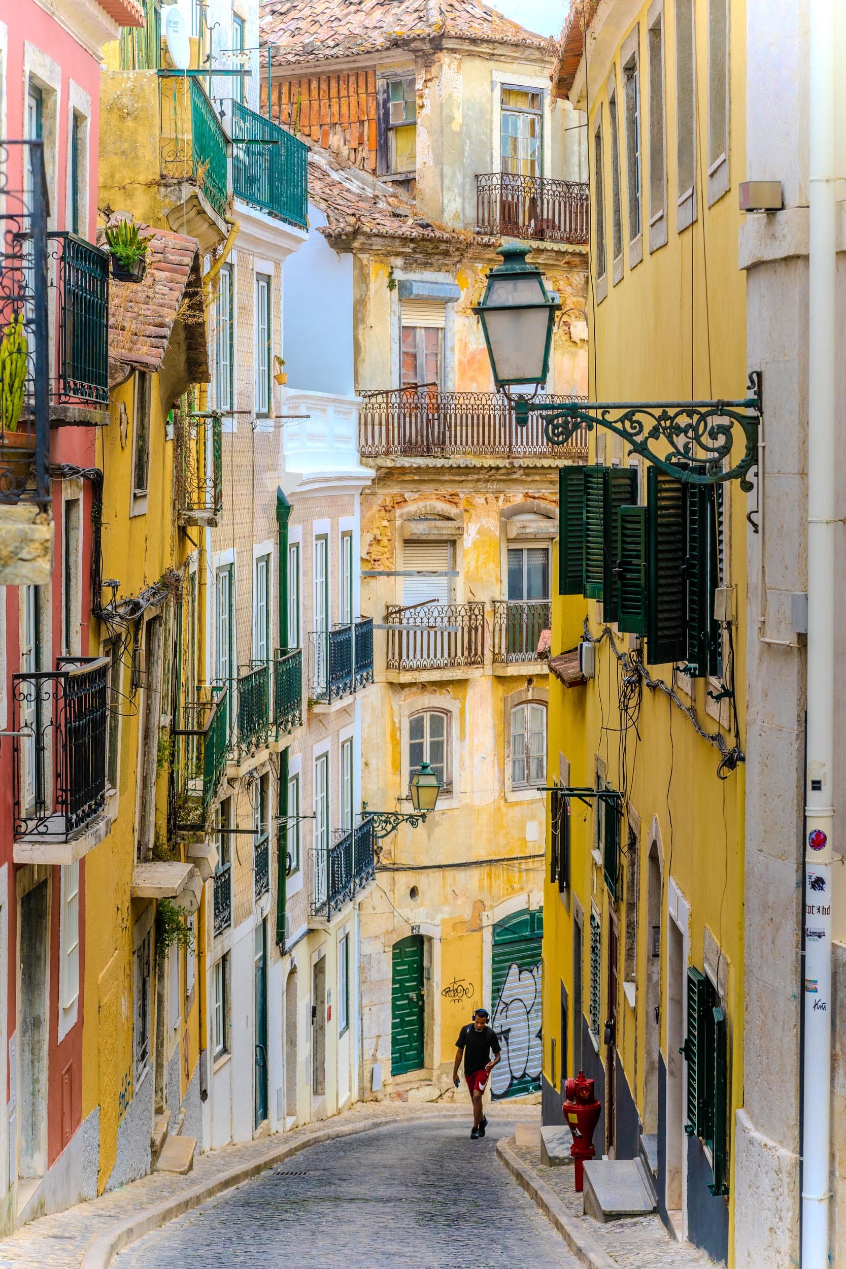 The winding, cobbled streets of Lisbon are perfect for aimless wandering. Photo: Fred Siggins