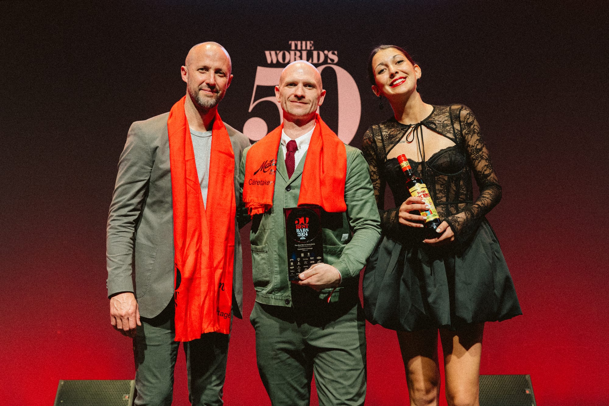 Ryan Noreiks (left) and Rob Libecans (centre) accepting the Michter's Art of Hospitality award at the The World's 50 Best Bars awards in 2024. Photo: The World's 50 Best Bars