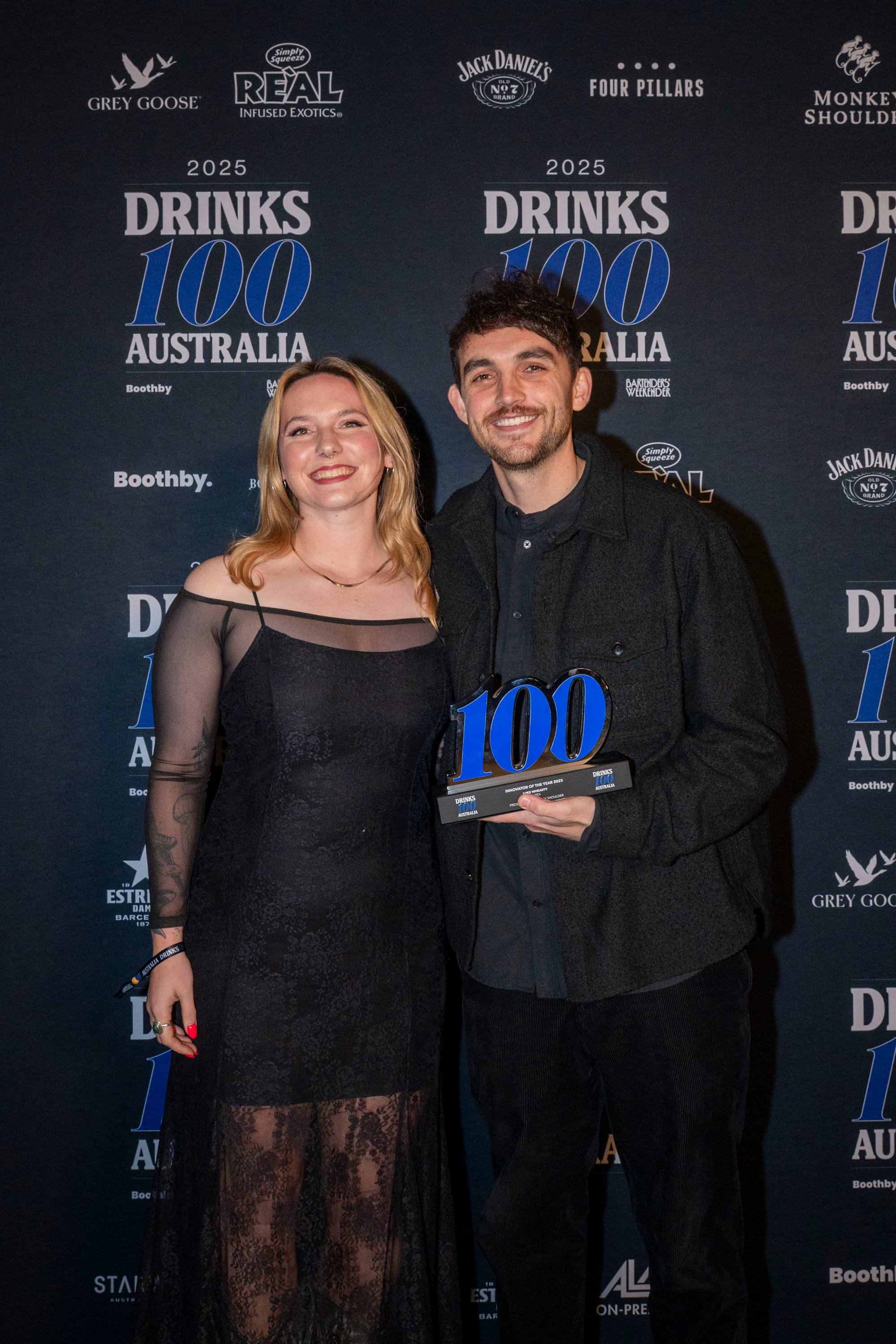 Samuel Thornhill (right) accepted the Innovator of the Year award on behalf of the winner, Luke Whearty, from Monkey Shoulder's Rachel Bartlett. Photo: Christopher Pearce/Bartenders' Weekender