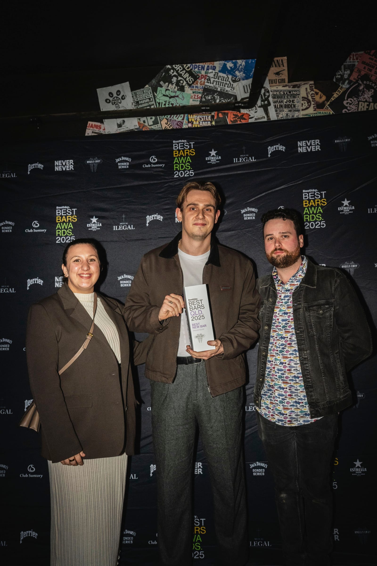 George Curtis and bar manager Aidan Perkins with Angel's Envy's Kayla Grigoriou (left). Photo: Christopher Pearce