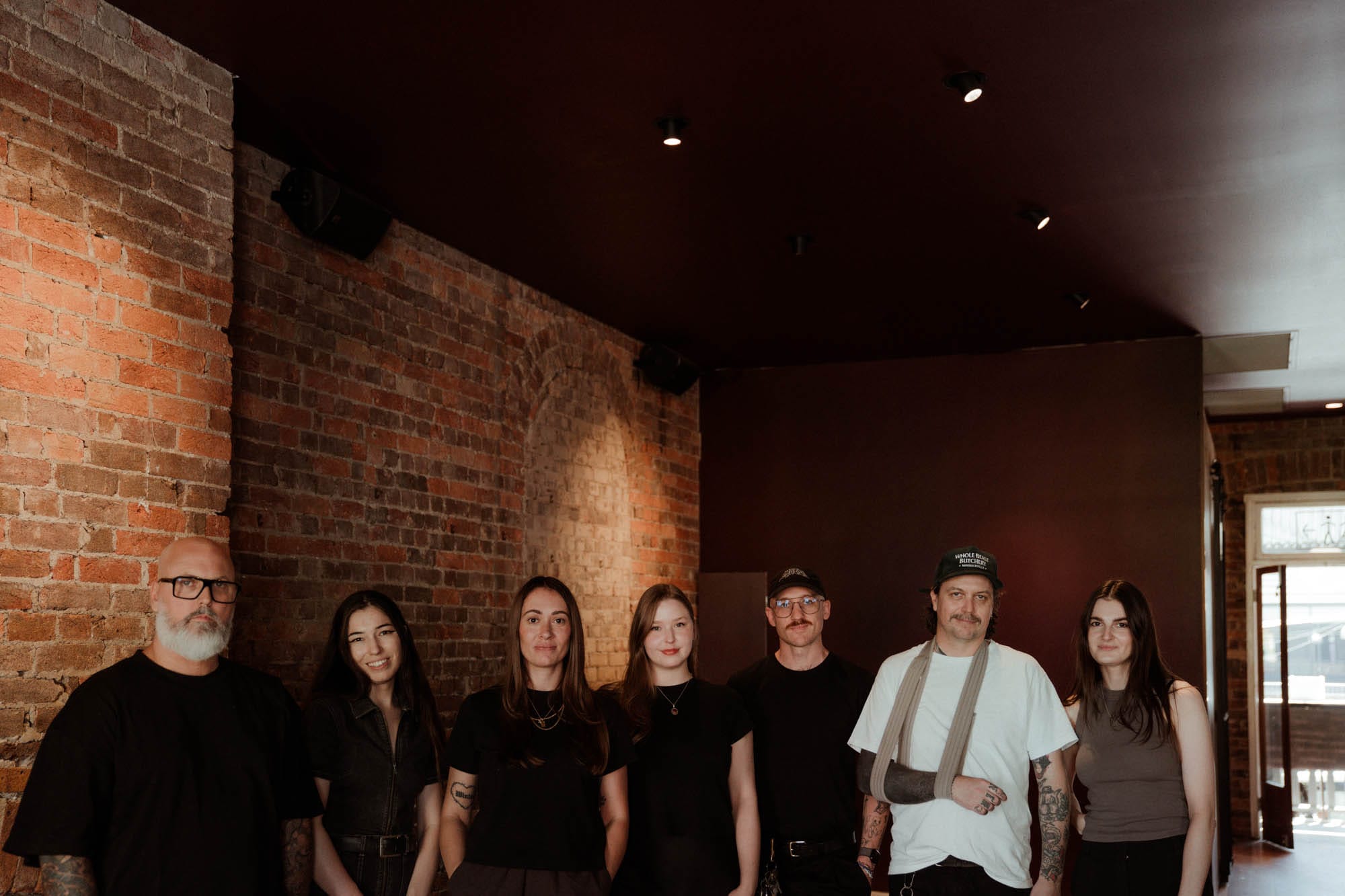 The team at Never Enough, including Mikey Pattinson (third from the right). Photo: Supplied
