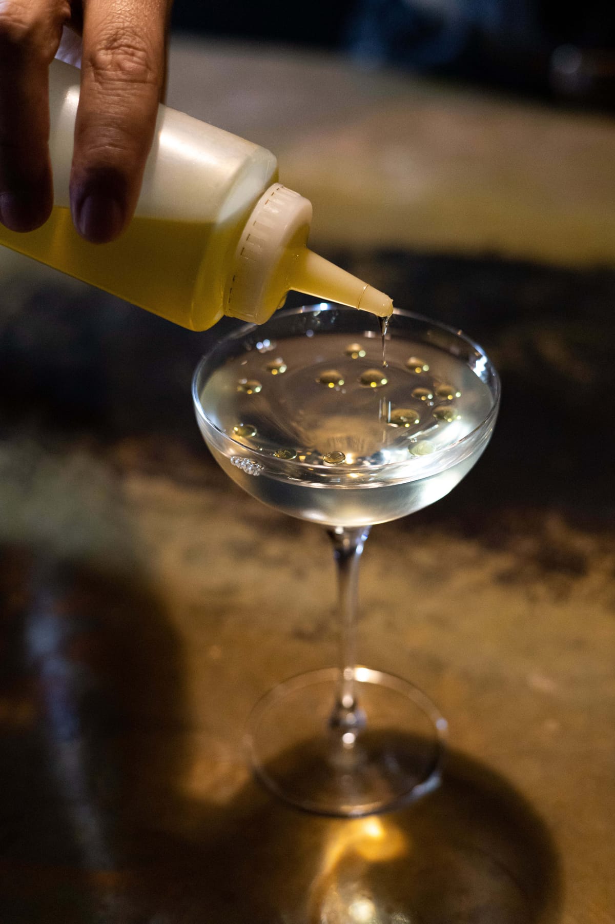 Get the recipe for the corn and mezcal led Martini-style drink, Coil, from Maker