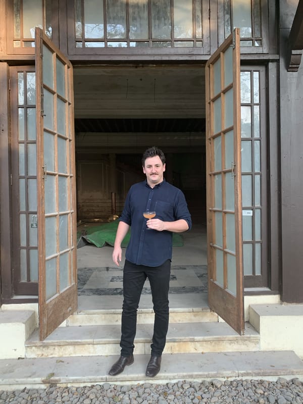 Jason Williams with the first Pegu Club cocktail made at the Pegu Club in decades. Photo: Supplied
