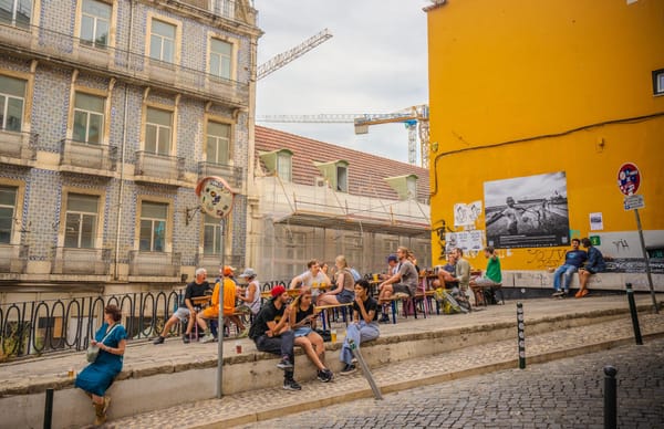 Lisbon locals cooling off with a brew outside craft beer bar Musa de Bica. Photo: Fred Siggins